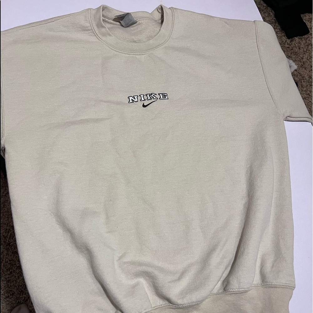 cream nike sweatshirt